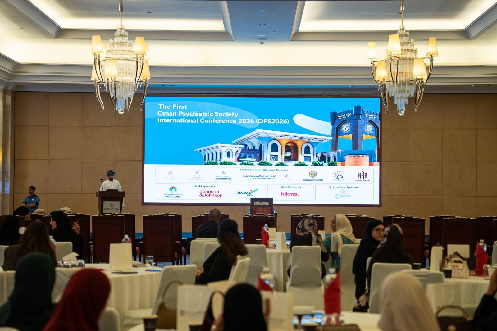 The OPS2026 opening ceremony stage with the conference screen