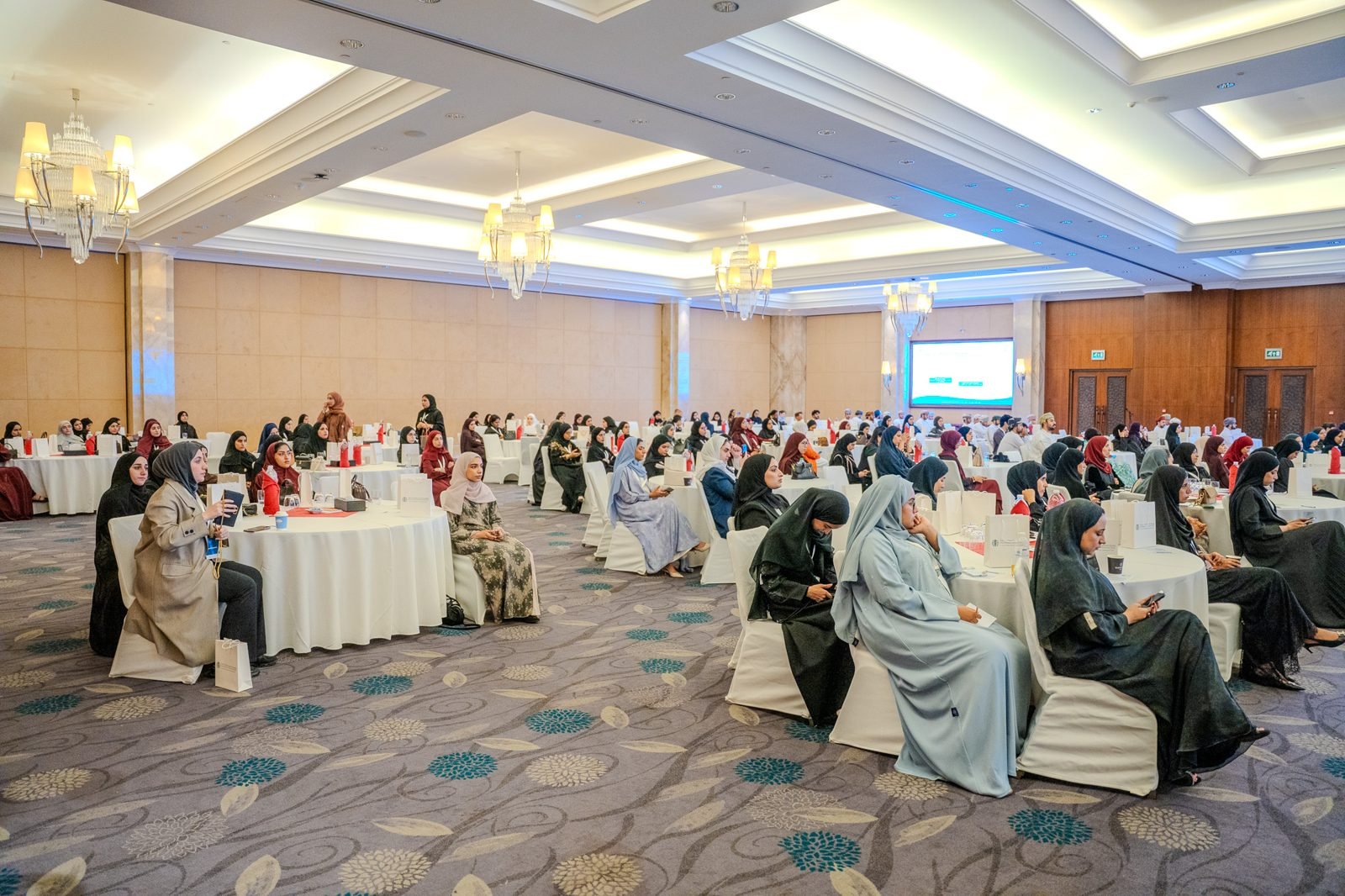 Delegates following a session in the conference hall at OPS2026